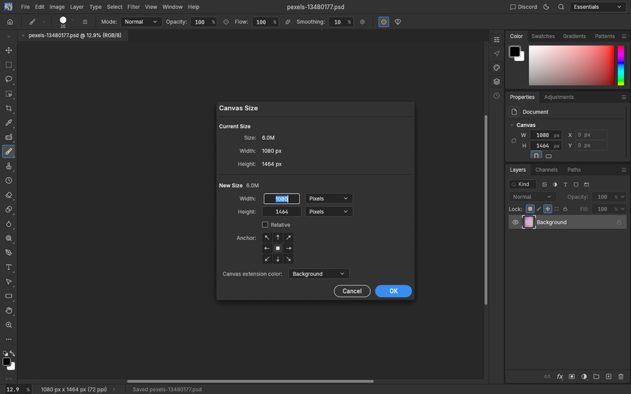The Canvas Size dialog open with anchor and extension options above the editable size fields.